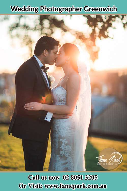 Photo of the Groom and the Bride kissing at the yard Greenwich NSW 2065