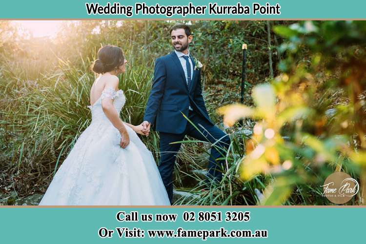 Photo of the Bride and the Groom going up the hill Kurraba Point NSW 2089