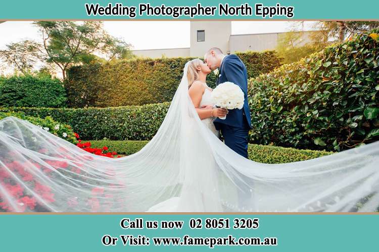 Photo of the Bride and the Groom kissing at the garden North Epping NSW 2121