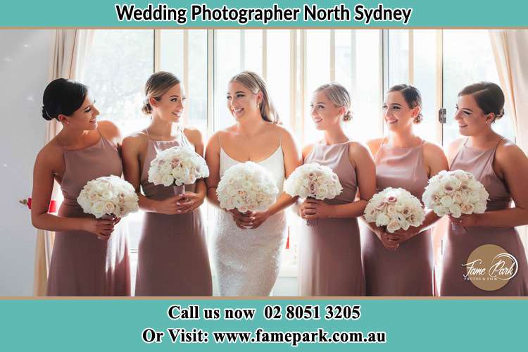 Photo of the Bride and the bridesmaids holding flower bouquet North Sydney NSW 2060